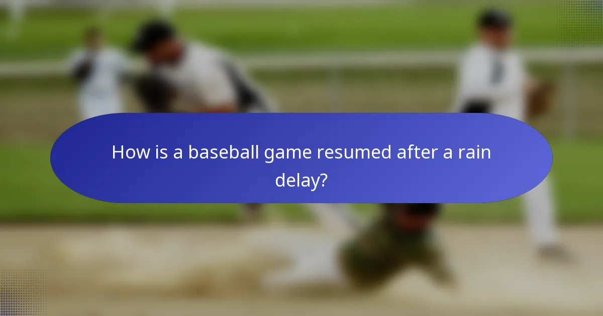 How is a baseball game resumed after a rain delay?