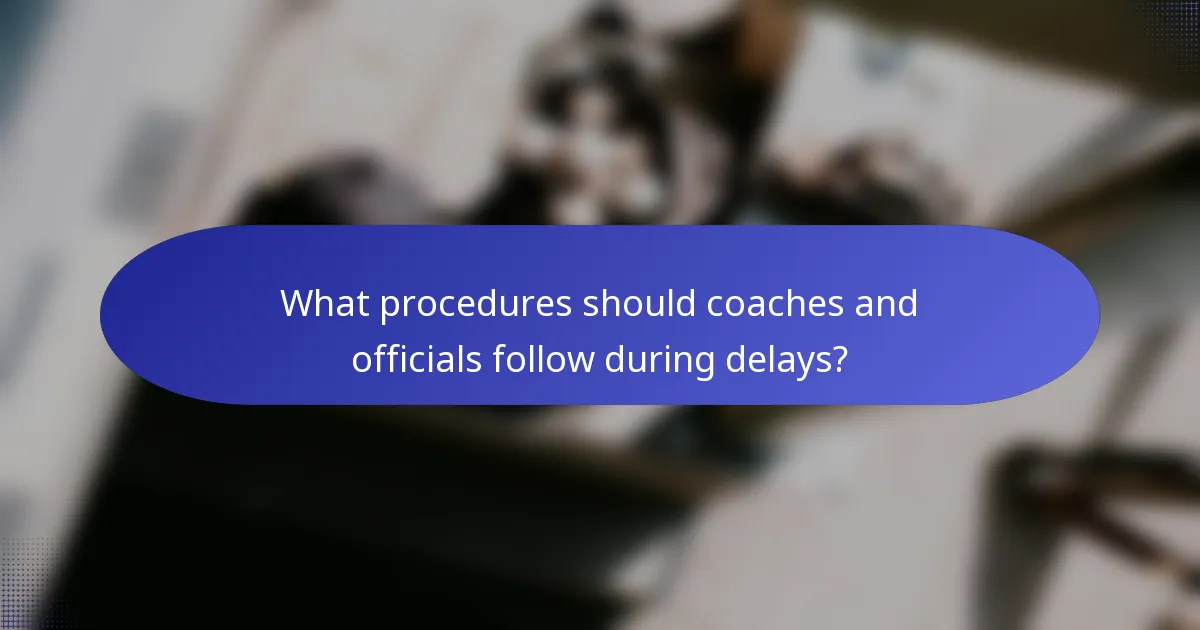 What procedures should coaches and officials follow during delays?